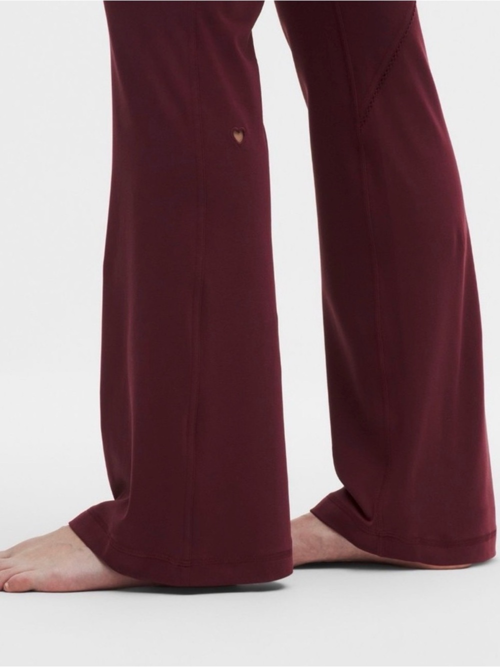 lululemon athletica Women's Wine Flare Leggings w/ heart cutout